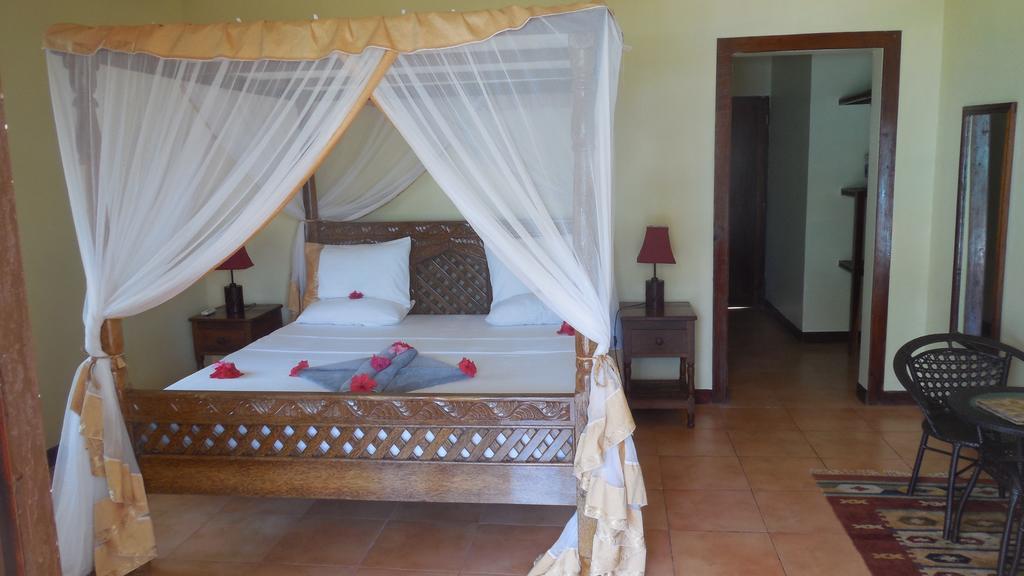 Arabian Nights Suites Hotel Paje Habitación foto